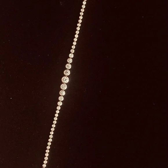 DIAMOND GRDUATING TENNIS BRACELET